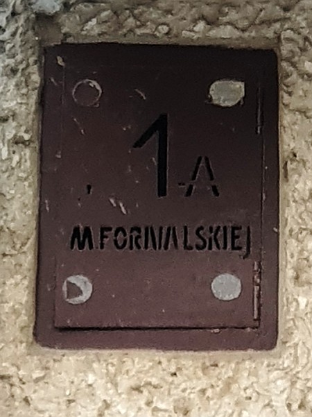 Tabliczka z numerem posesji - Małgorzaty Fornalskiej 1a